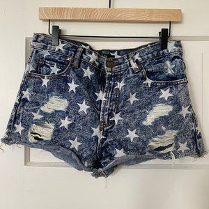 Denim cutoff shorts with white stars, distressed